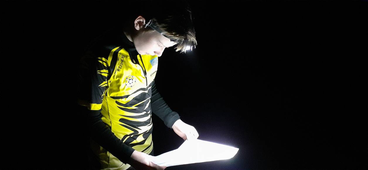 Family night orienteering after having received the prize