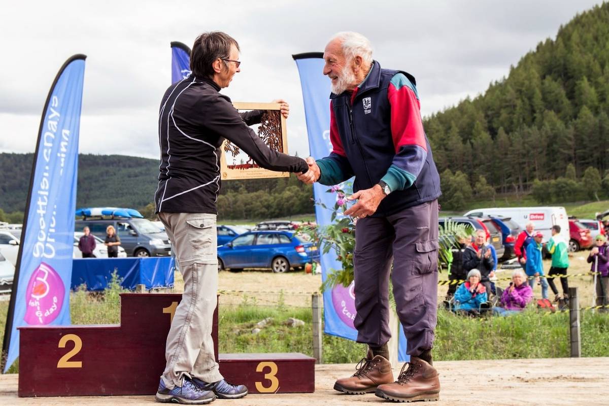 Left to right: Chair, Judith Holt, presenting the award to Chris James