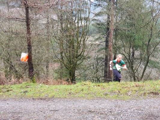 Control in site! A female squad member approaches at the training camp at Gower