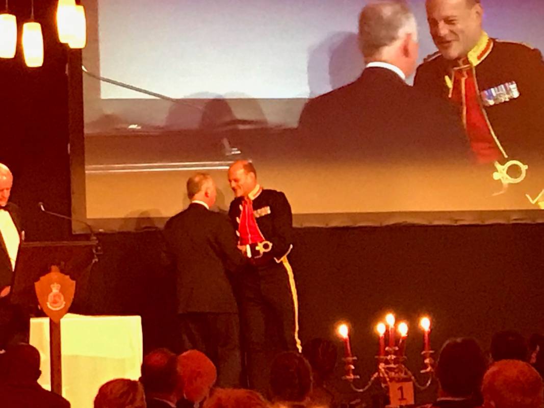 Charles Bromley Gardner receiving his award