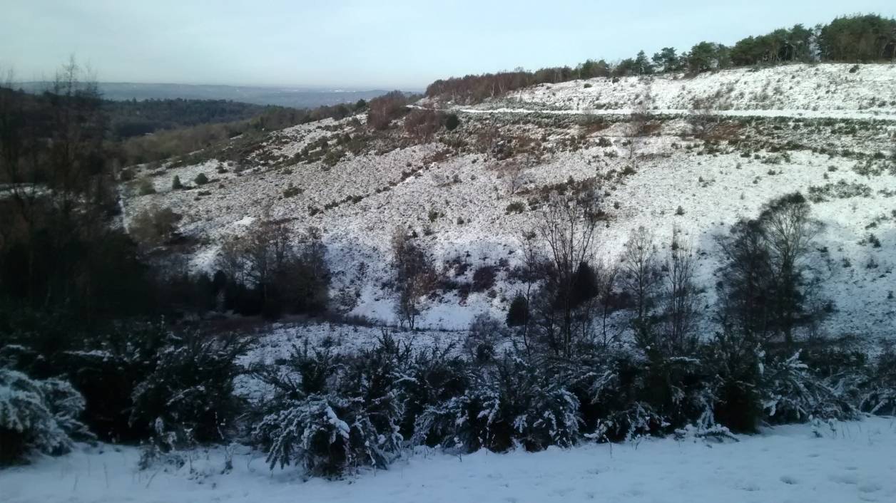 A view back across the snowy bowl