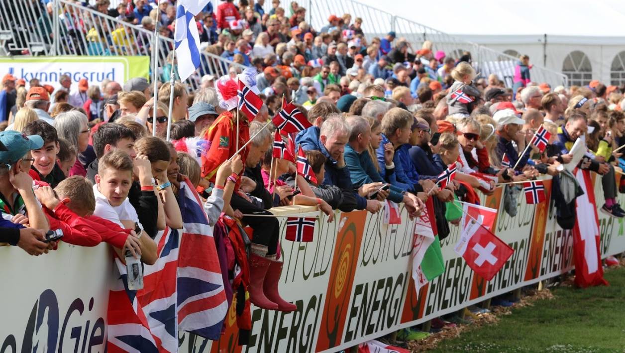 Spectators cheer on.  Photo credit: Rob Lines